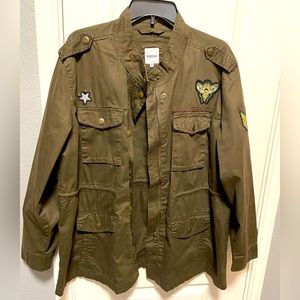 Kenzie size XL army jacket with patches and sequins. It’s adorable.